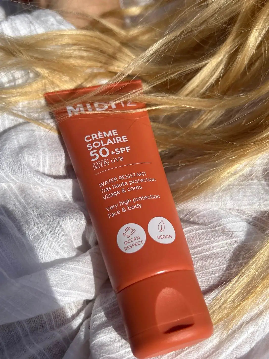Crème Visage Haute Protection sur cheveux blond