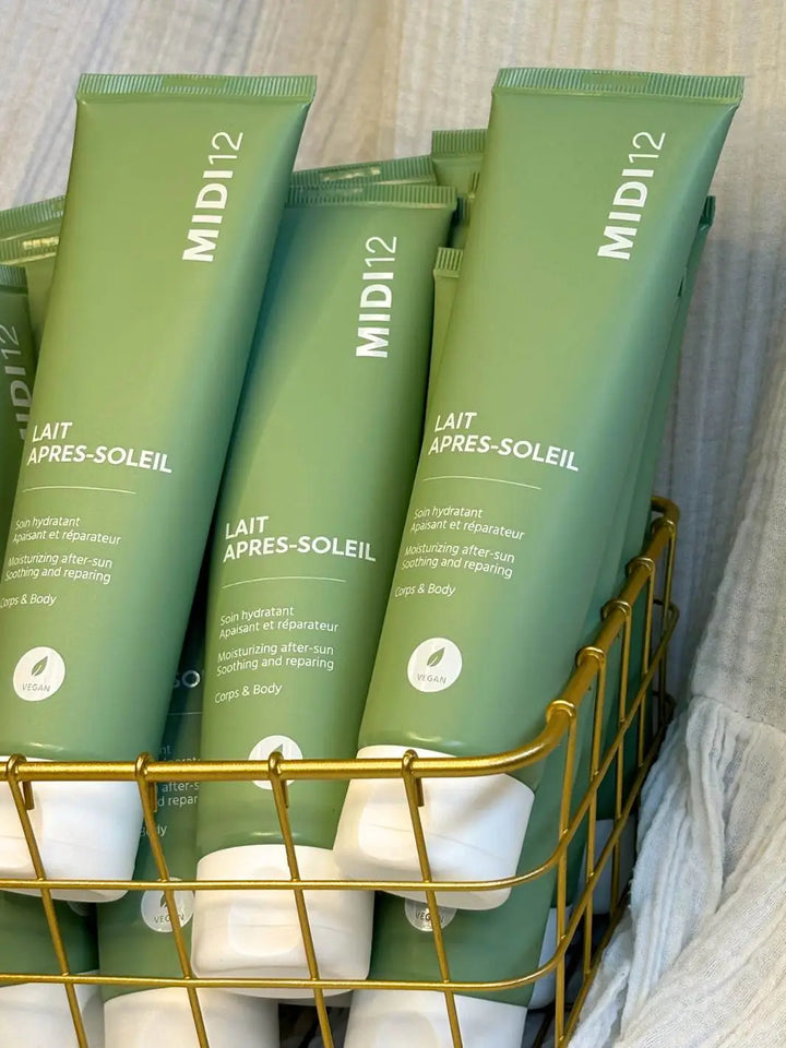 lait après soleil dans panier avec ingrédients actifs